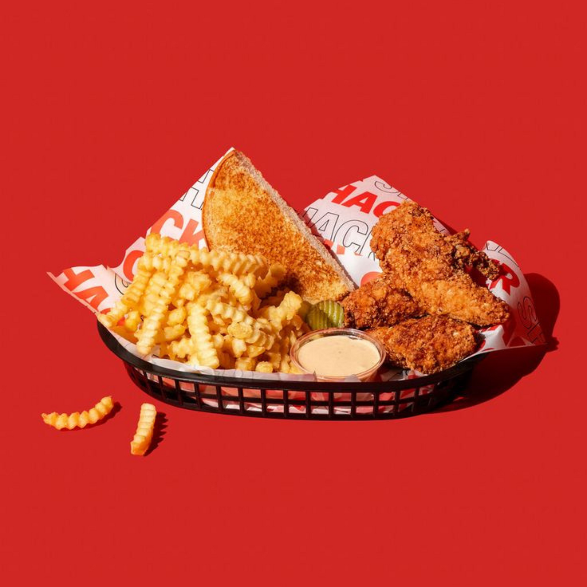 Custom fish and chips wrapping paper with branded design.