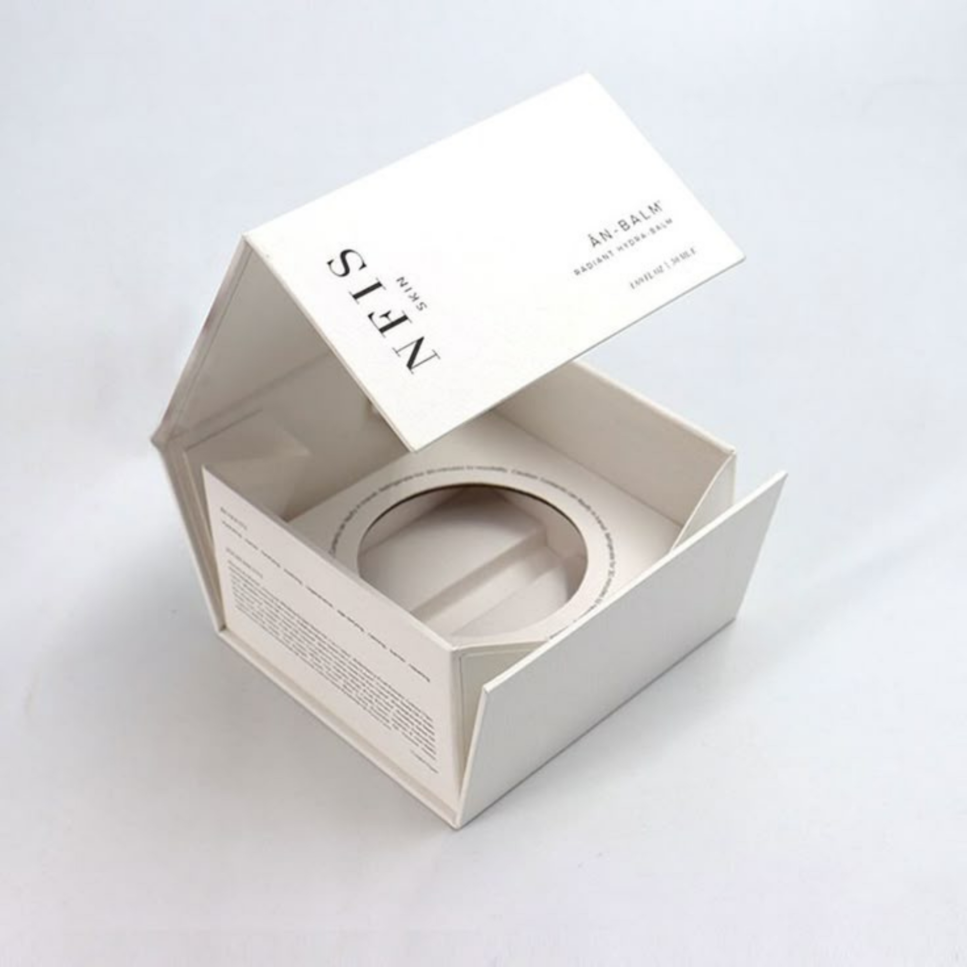 Collapsible candle box with rigid insert