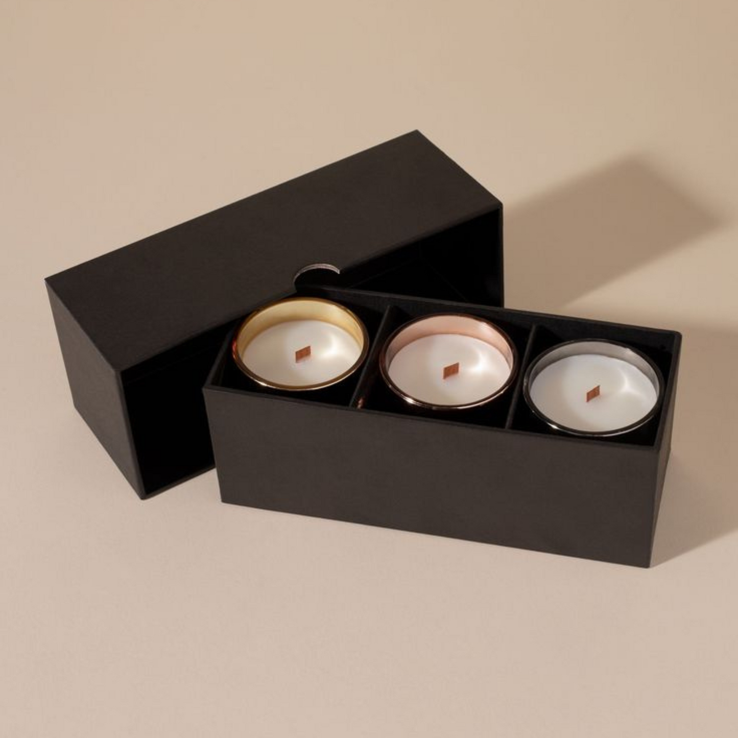 Two piece rigid candle box for multiple candles