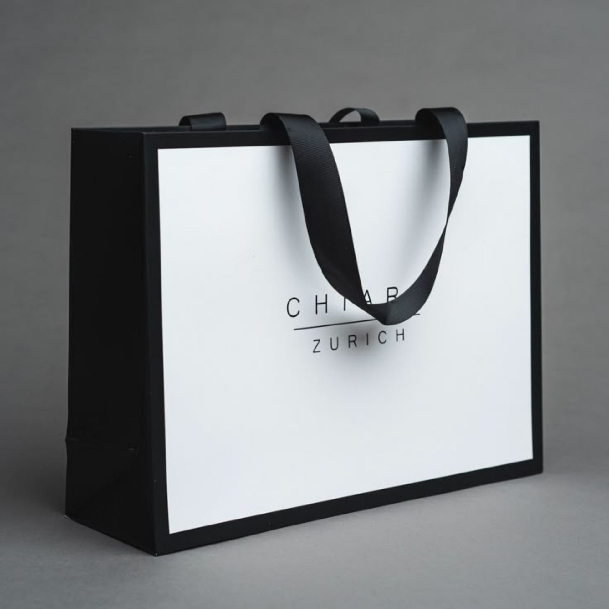 Bulk wholesale paper bags in various sizes for packaging retail products.