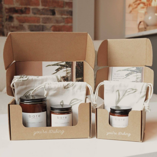 Eco-friendly candle subscription box made from kraft material.