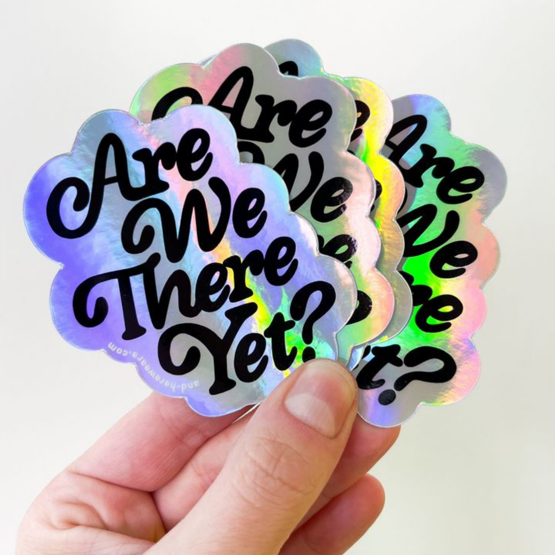 Custom holographic stickers with rainbow shine by Custapack