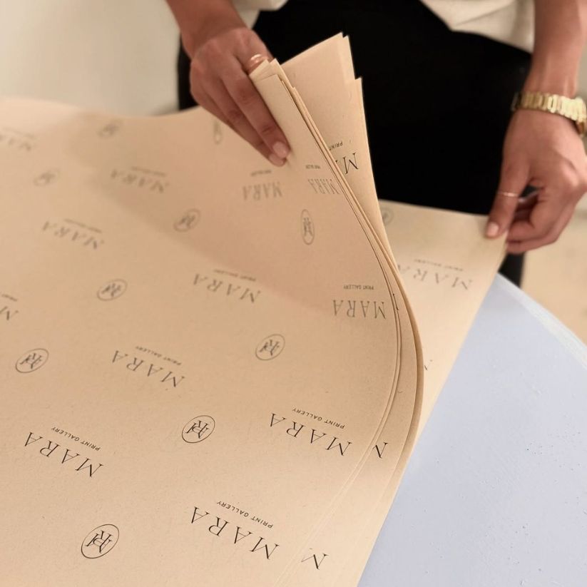 Custom logo tissue paper for boutique, apparel, and gift packaging brands.