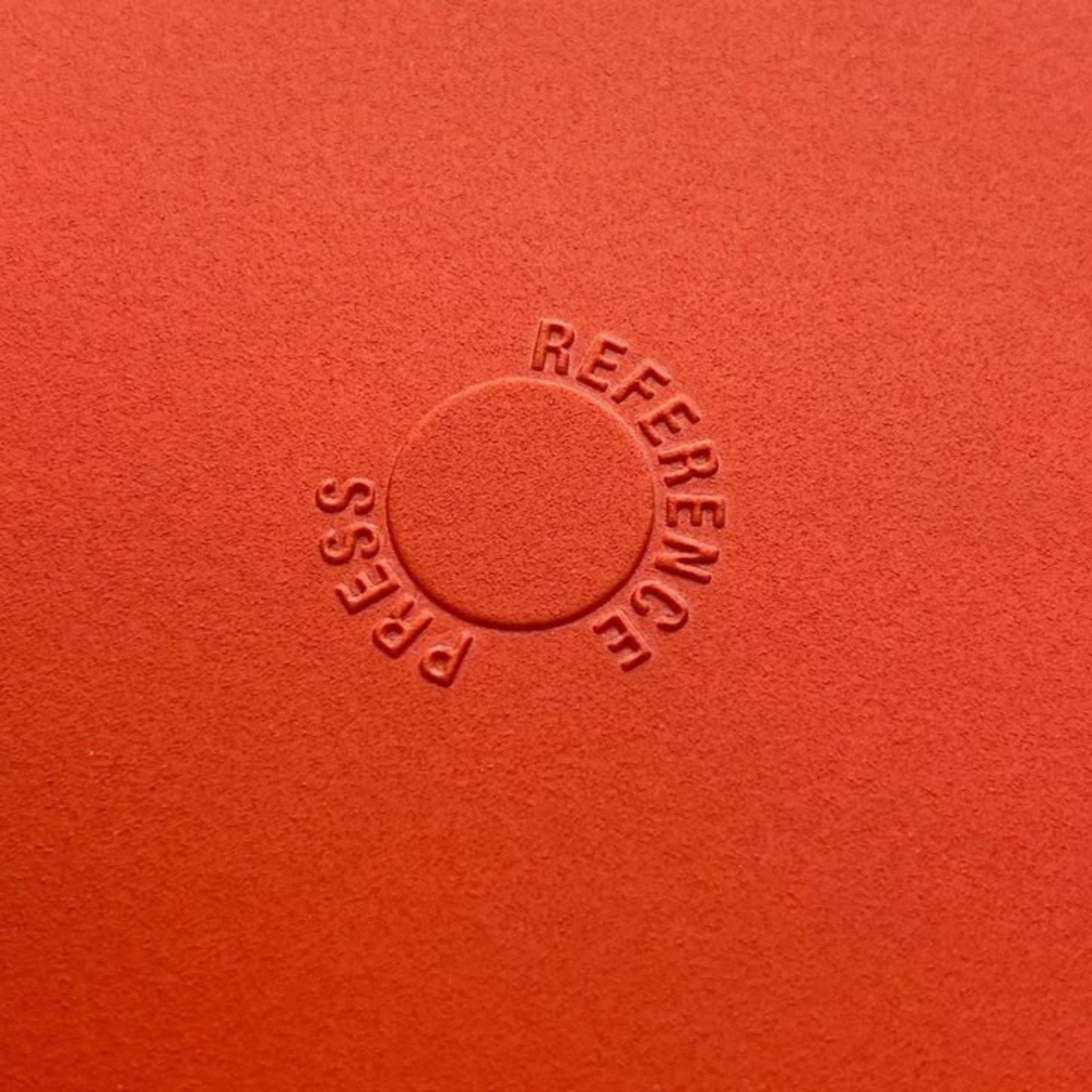 Custom paper packaging with embossed design for a tactile and elegant finish.