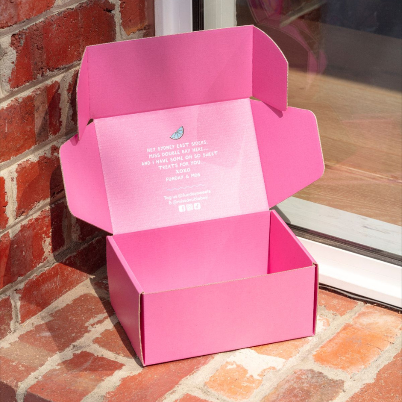 Premium ecommerce mailer box packaging for shipping and subscription brands.