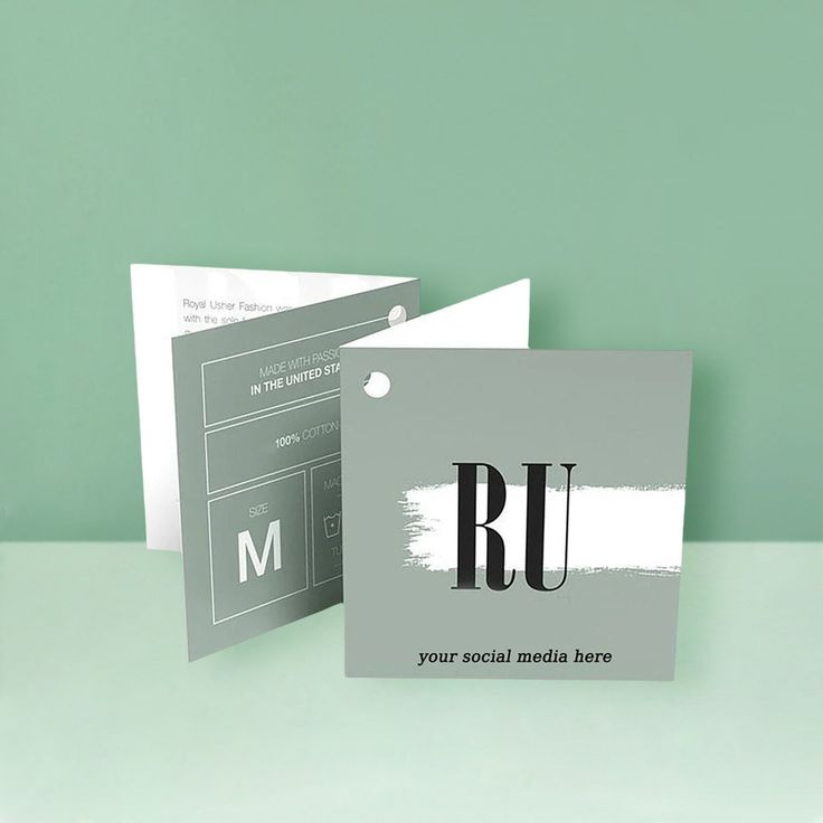 Premium folded clothing hang tags with custom logo printing and finishing options.