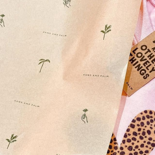 Printed kraft tissue paper for retail, gift, and eCommerce packaging.